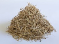 A pile of sugar cane mulch on a white background