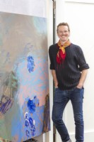 Doug Schofield artist and garden creator in studio