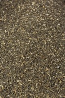 A close up of a sample of sandy soil
