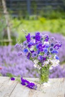 Floral arrangement with Lathyrus 'High Scent' - Sweet Pea, Centurea 'Double Blue' - Cornflower, Consolida ajacis 'Blue spire', Echinops ritro, Verbena bonariensis