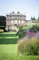 Herbaceous borders leading towards Newby Hall in July