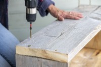 Screwing wooden boards together to make a trough