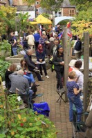 Grapes Hill garden in the heart of the city of Norwich is full of people of all ages, backgrounds and ethnicities for the 'Celebration of International Culture' event.