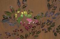 Detail of filigree corten steel panel - Colour Box garden, RHS Hampton Court Palace Flower Show 2017