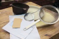 Domestic sieves, containers and storage envelopes for cleaning garden saved seeds
