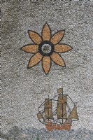 Detail of mosaic of sailing boat and flower in wall of Fonte Nascente - Fountain of the Source. Seixal, near Setubal, Portugal. September