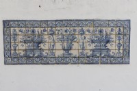 Rectangular section of wall faced with blue glazed tiles known as Azulejos. Seixal, near Setubal, Portugal,September