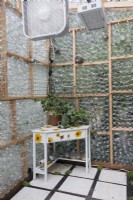 Interior of greenhouse made from recycled glass bottles.