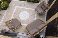 Aerial view of patio and furniture with Arabic style ceramic tiles