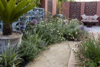 Mediterranean gravel garden in suburban garden