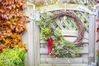 Wreath hanging on a wooden gate