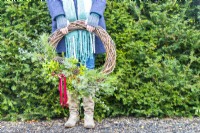 Woman holding wreath