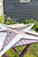 Wooden star on table