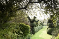 Topiary in yew and box at Balmoral Cottage, Kent in April created by Charlotte Molesworth.