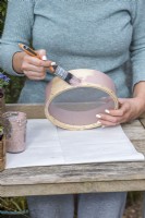 Step-by-Step Planting Wooden Flour Sieves with Spring Flowers. Step 1: using an outdoor paint, apply several coats to the bentwood flour sieve.