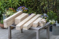 Step-by-Step Making a Potting Bench. Step 1: lengths of timber cut to correct lengths prior to assembly for a woodworking project