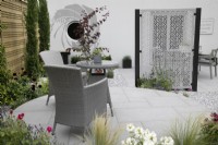 'A Very British Affair' on APL Avenue - BBC Gardener's World Live 2021 - featuring circular theme with paved seating area surrounded by drought tolerant planting in gravel garden