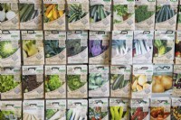 A variety of vegetable and salad seeds for sale in a garden centre. 