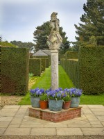The Scottish Sundial with hedges and flower borders Old Vicarage Gardens  East Ruston Norfolk