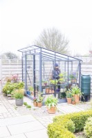 Woman working in a greenhouse