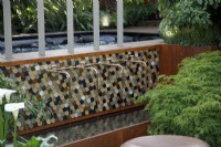 Water feature with bespoke copper taps in the Out of The Shadows Garden - Designer and Sponsor: Kate Gould Gardens