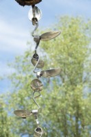 Rain watering system made of old spoons.