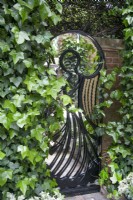 The Trompe l'oeil Angel Gate with mirror at Hamilton House garden in May 