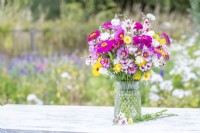 Bouquet containing Cosmos 'Candy Stripe', Calendula 'Art Shades', Calendula 'Snow Princess', Antirrhinum 'Lucky Lips', Zinnia 'Purple Prince and Centaurea 'Ball White' - Cornflower