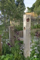 Wildlife area in The Wooden Spoon Garden at RHS Hampton Court Palace Garden Festival 2022
