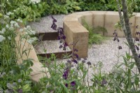 Sunken terrace in The Wooden Spoon Garden at RHS Hampton Court Palace Garden Festival 2022