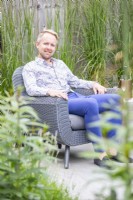 Man sitting on chair in garden