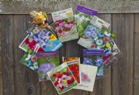 Collection of empty seed packets turned into a potting shed decoration