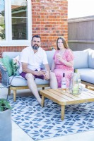 Garden owners sitting on a settee