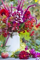 Red themed bouquet containing Dahlia, Guelder rose branches with berries and Love Lies Bleeding.