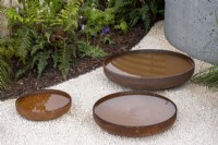 Corten steel circular water bowls - The Vitamin G Garden, RHS Malvern Spring Festival 2022
