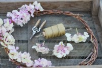 Ingredients and tools for making a Hydrangea wreath in late Summer.