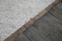 Railway sleeper path contrasting with white stone chippings in The Lexus Kansho-niwa Experience garden at BBC Gardener's World Live 2022
