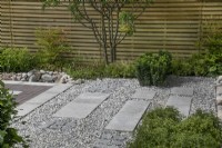 Mixed materials on the pathway in The Memories of Mountains Garden Retreat Garden at BBC Gardeners World Live 2022