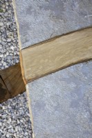 Wood inlaid in steps and gravel as detail. 