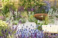 Water bowl feature in low maintenance gravel garden with drought-tolerant herbaceous plants to attract pollinators, such as Salvia, Eryngium, Stachys byzantina and Achillea 'Credo' - Turfed Out Garden, RHS Hampton Court Palace Garden Festival 2022