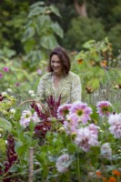 Susie Harris-Leblond picking flowers in her cutting garden