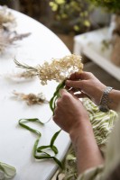 Close up of wreath making 