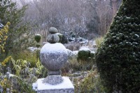 Finial on the edge of the Box Garden at Lower House in December.