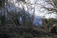 Clearing and pruning. Bonfire. The Garden House, Yelverton, Devon