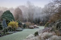 View of mixed beds down to Gazebo on a frosty morning. 