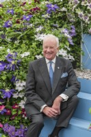 Raymond Evison, of Guernsey Clematis Nursery, at the Chelsea Flower Show 2022 where the exhibit won his 32nd Gold Medal.