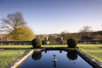 Lily pond on the Jewson Terrace at Cotswold Farm Garden in February