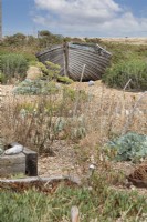 Garden with a boat made on a shingle beach, by Derek Jarman, Dungeness
