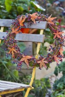 Wreath made from Boston ivy and japanese maple foliage.
