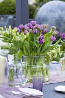 Bunch of tulips in glass vase.